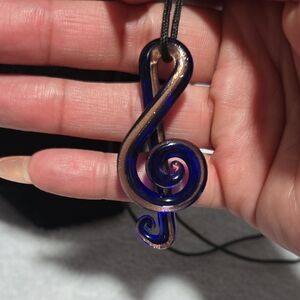 Blue and Bronze Treble Clef Glass Pendant